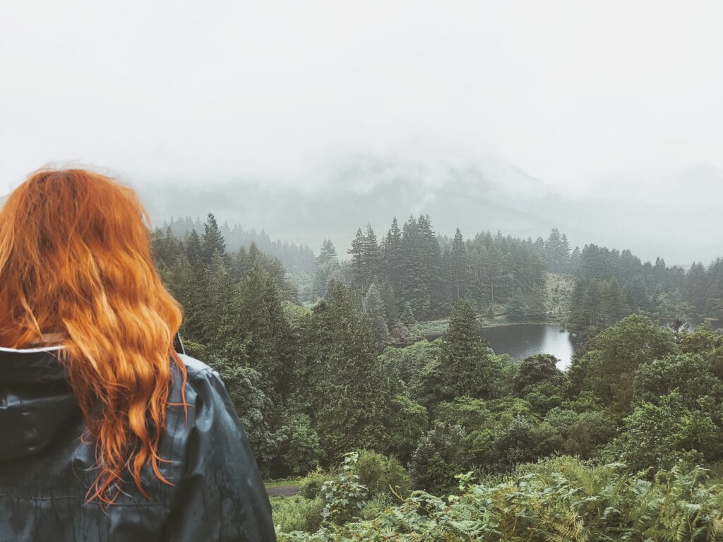 Girl and Glencoe mountains