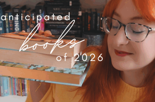 a ginger girl holding up a stack of books